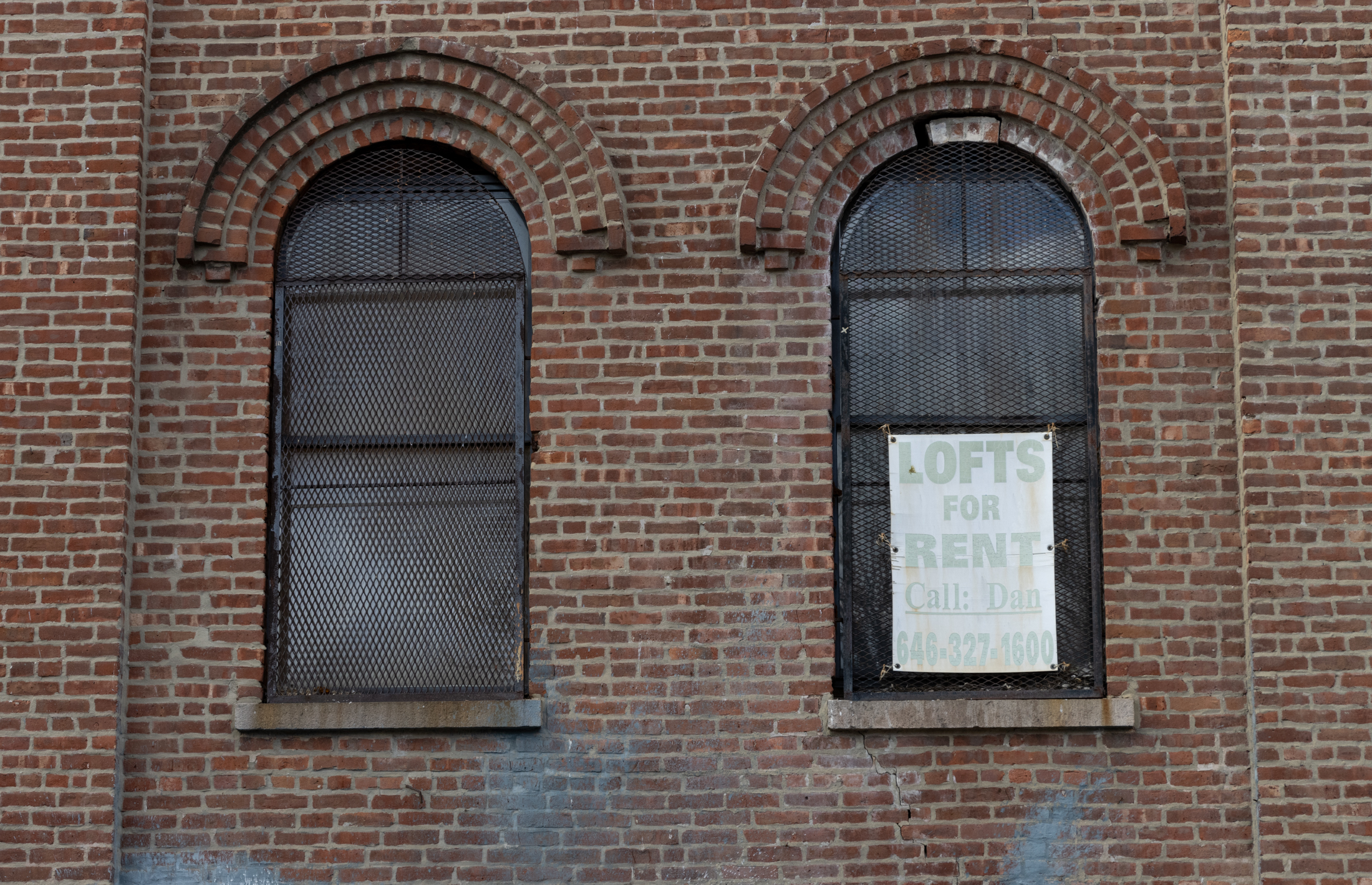 sign advertising lofts for rent in a window