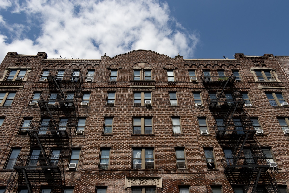 cohn brothers - a brown brick apartment building