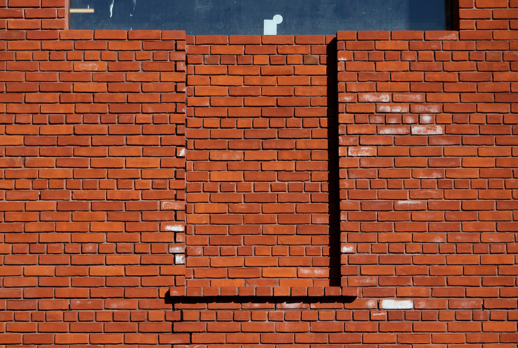 brick details showing fake bricked-up window