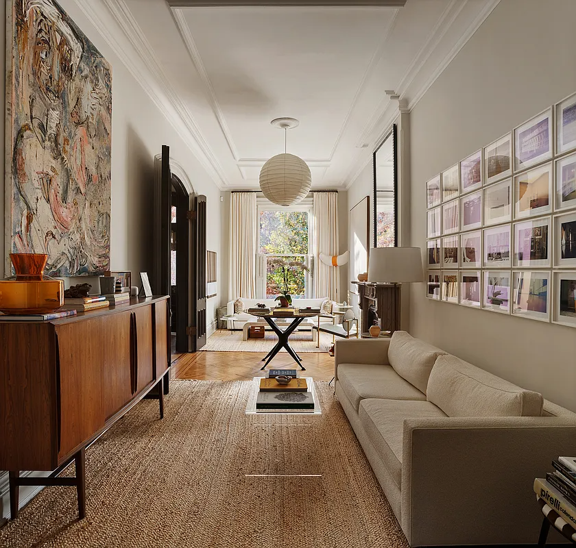 parlor with wood floor, marble mantel