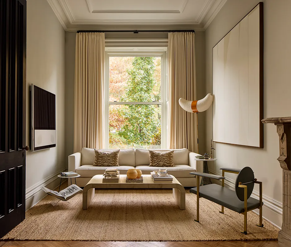 parlor with marlbe mantel, wood floor