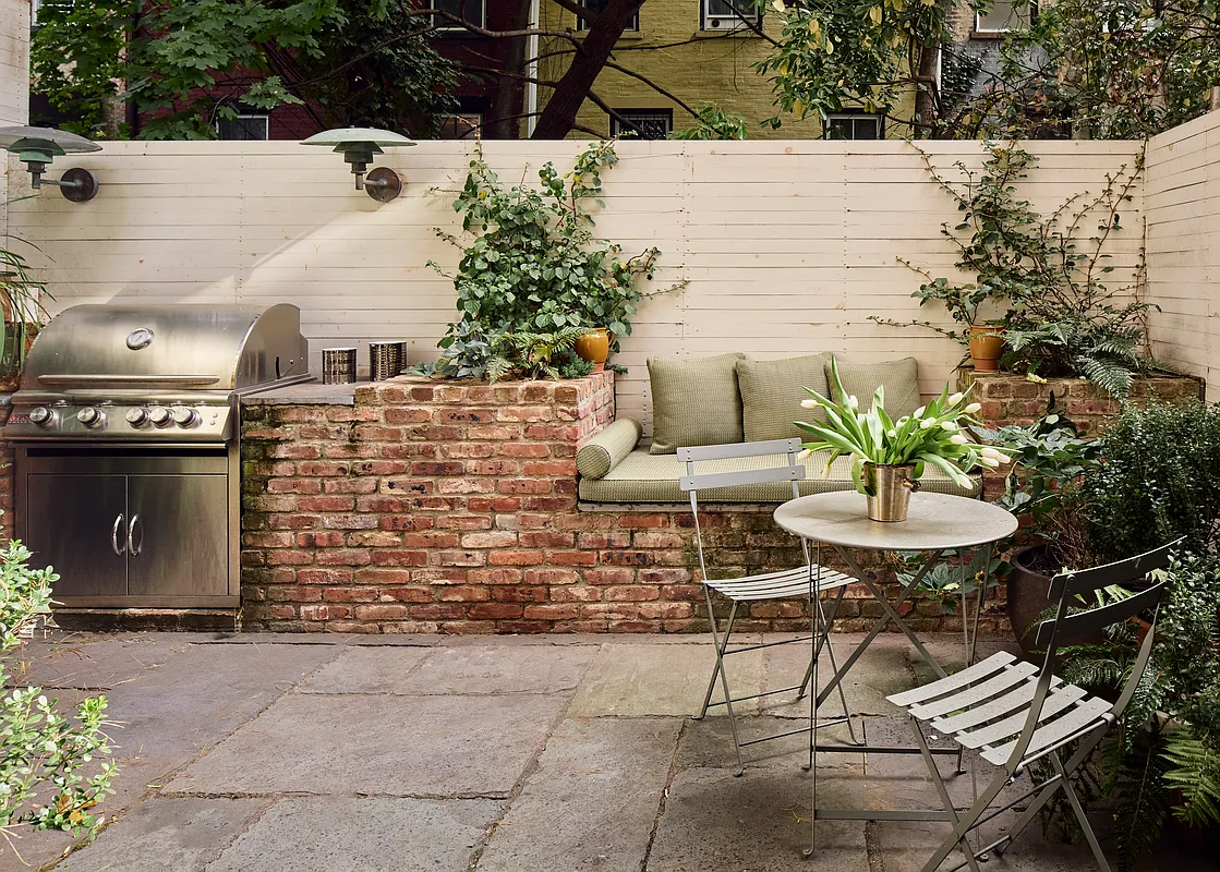 garden with built-in seating and barbeque area