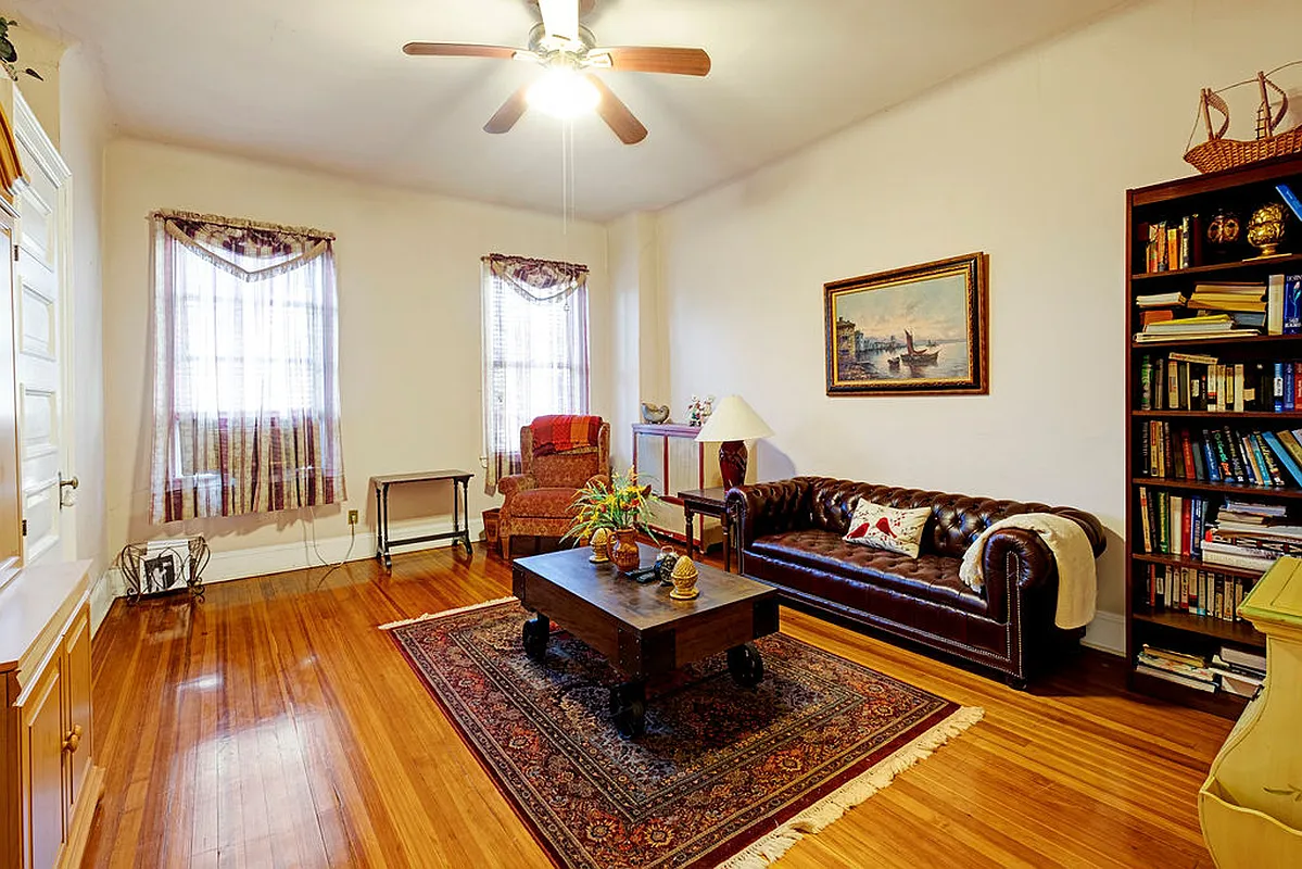 bedroom set up as a living room