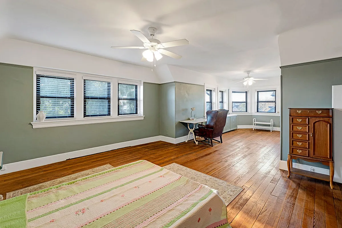 bedroom with wood floor