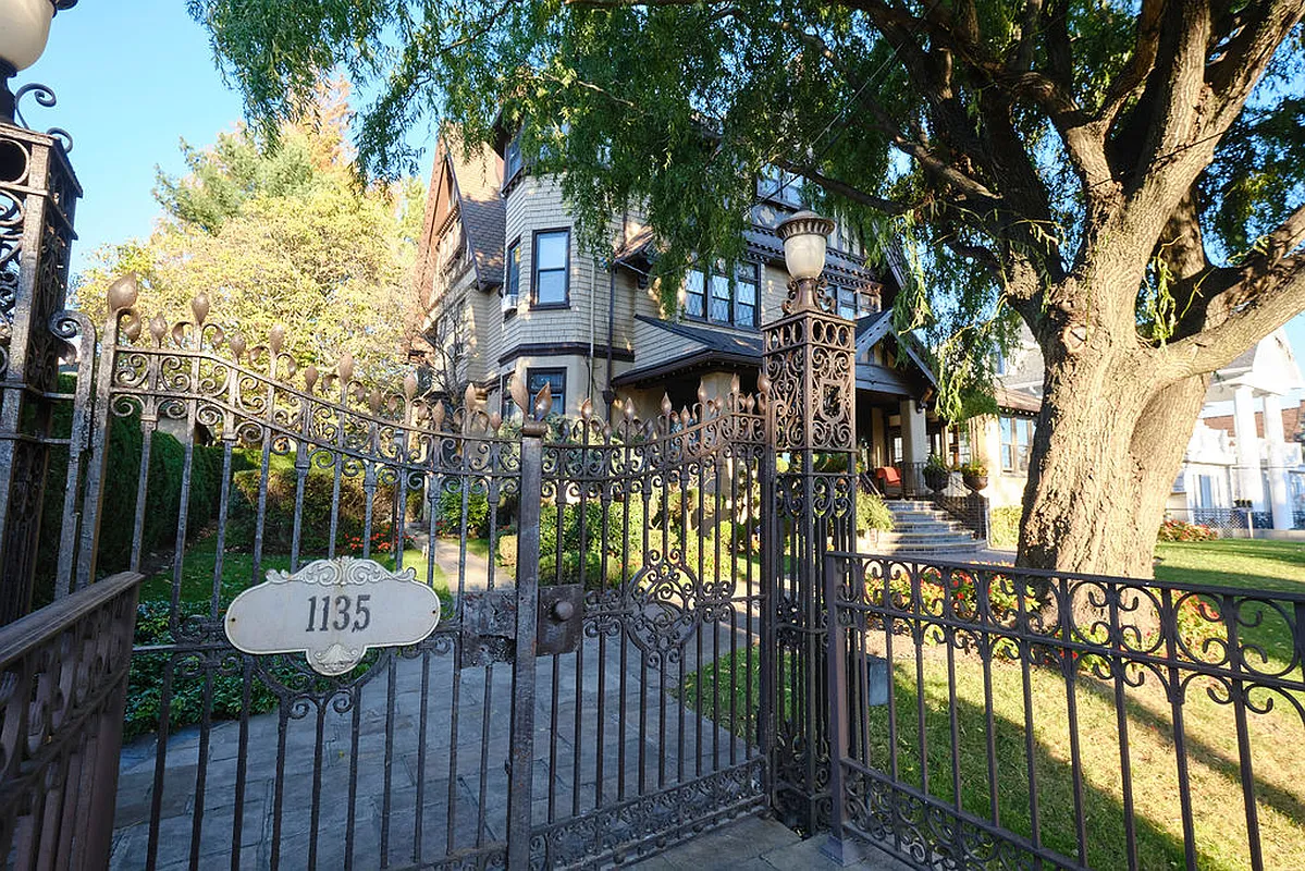 exterior showing fence with gate with "S" initial