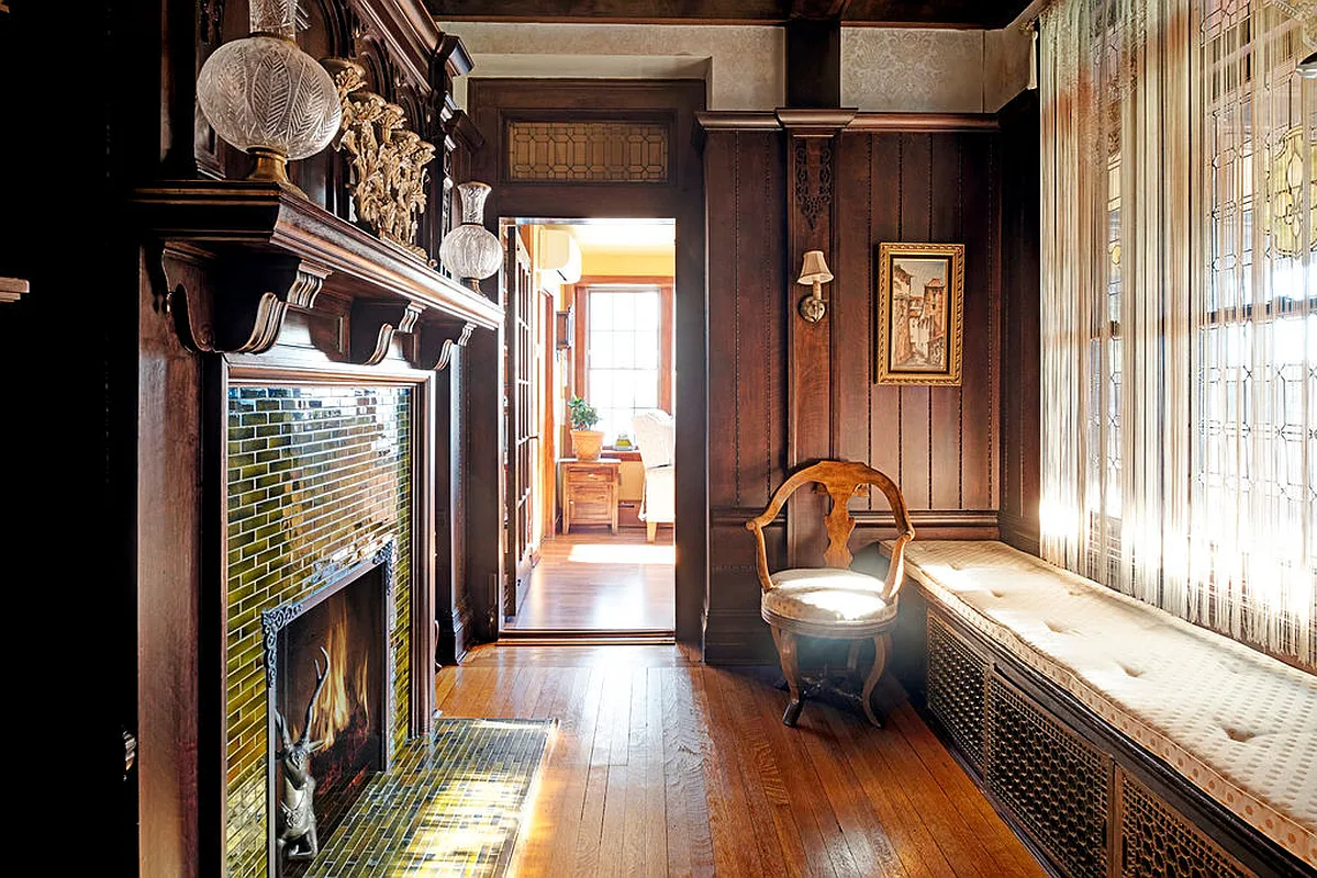 fireplace and built-in bench in entry