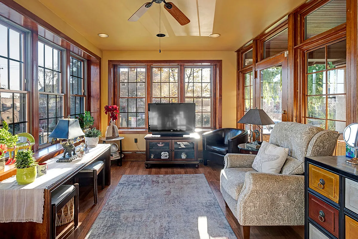 sun room with yellow walls