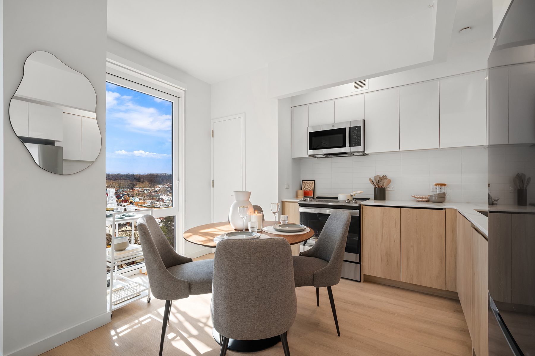 rendering of a kitchen with a floor to ceiling window