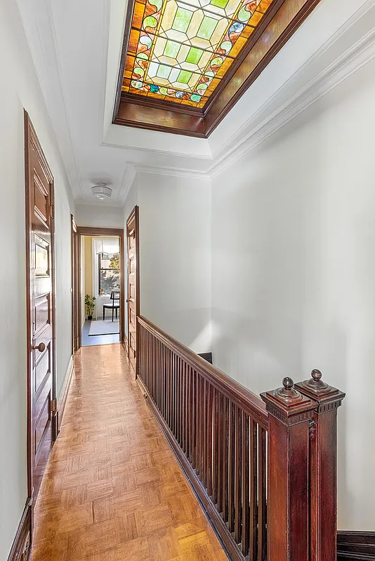 top floor hall with stained glass skylight