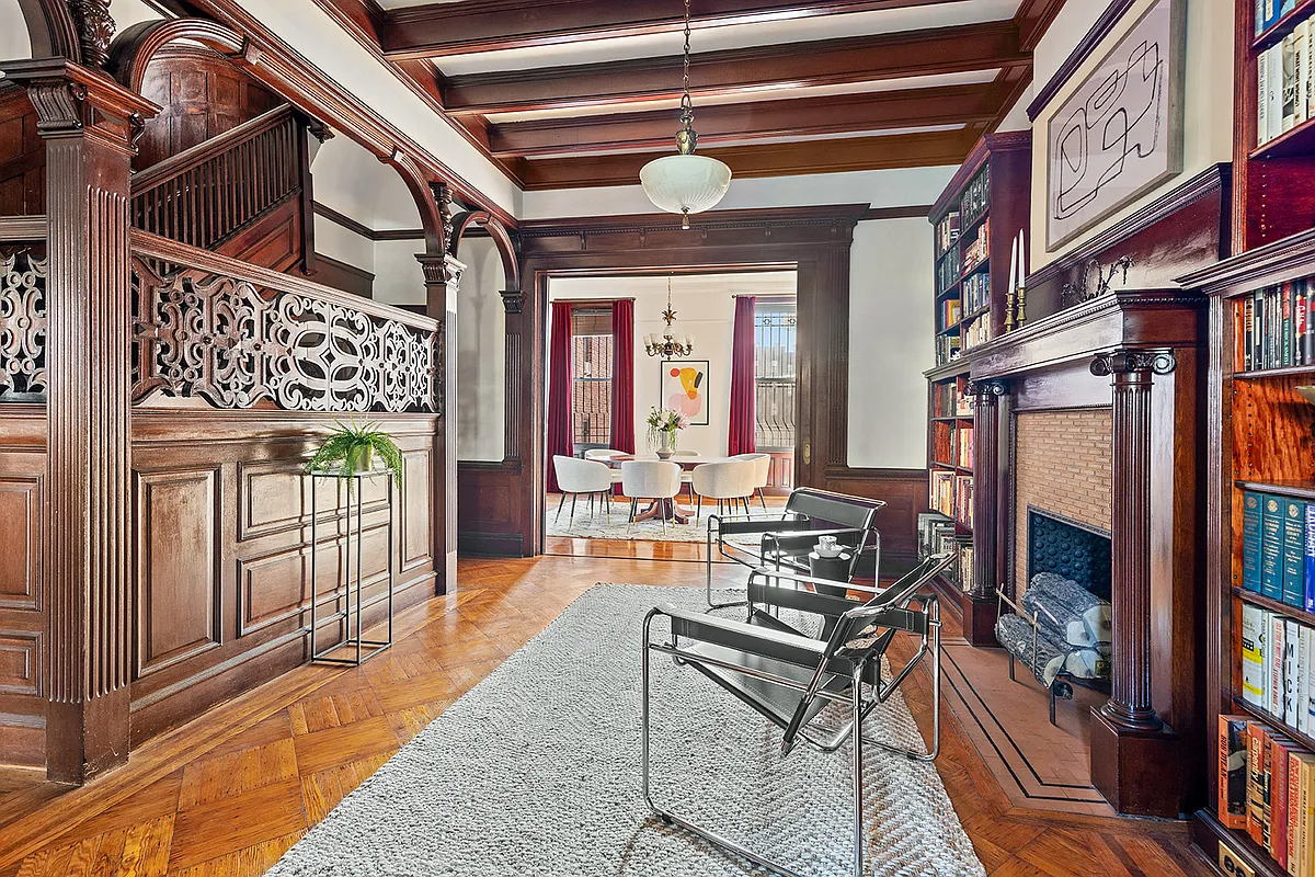 middle parlor with stair and columned mantel