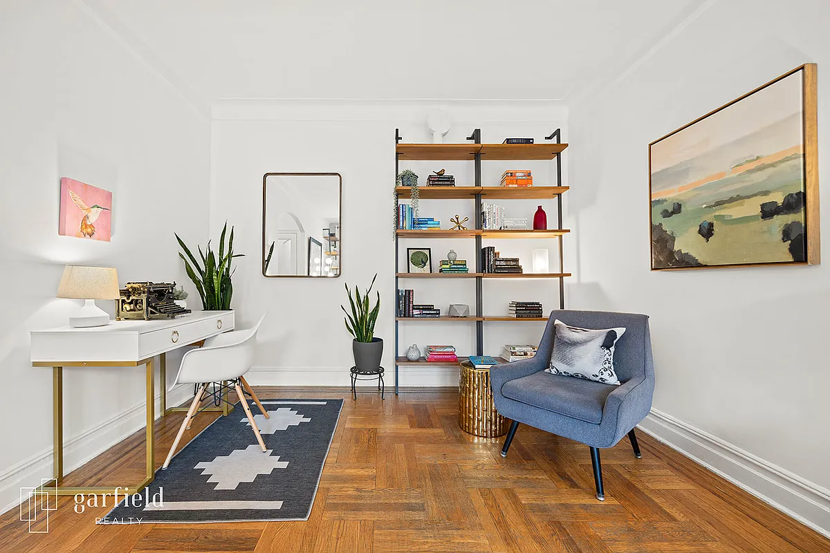 living room with wood floor, white walls