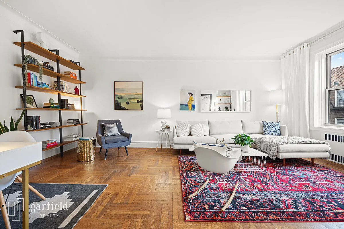 living room with wood floor, white walls