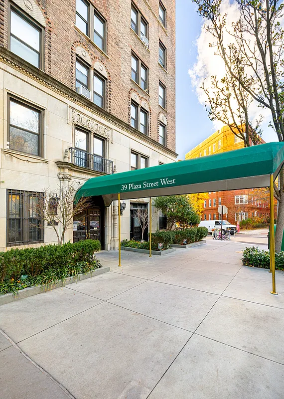 exterior with green awning at entry