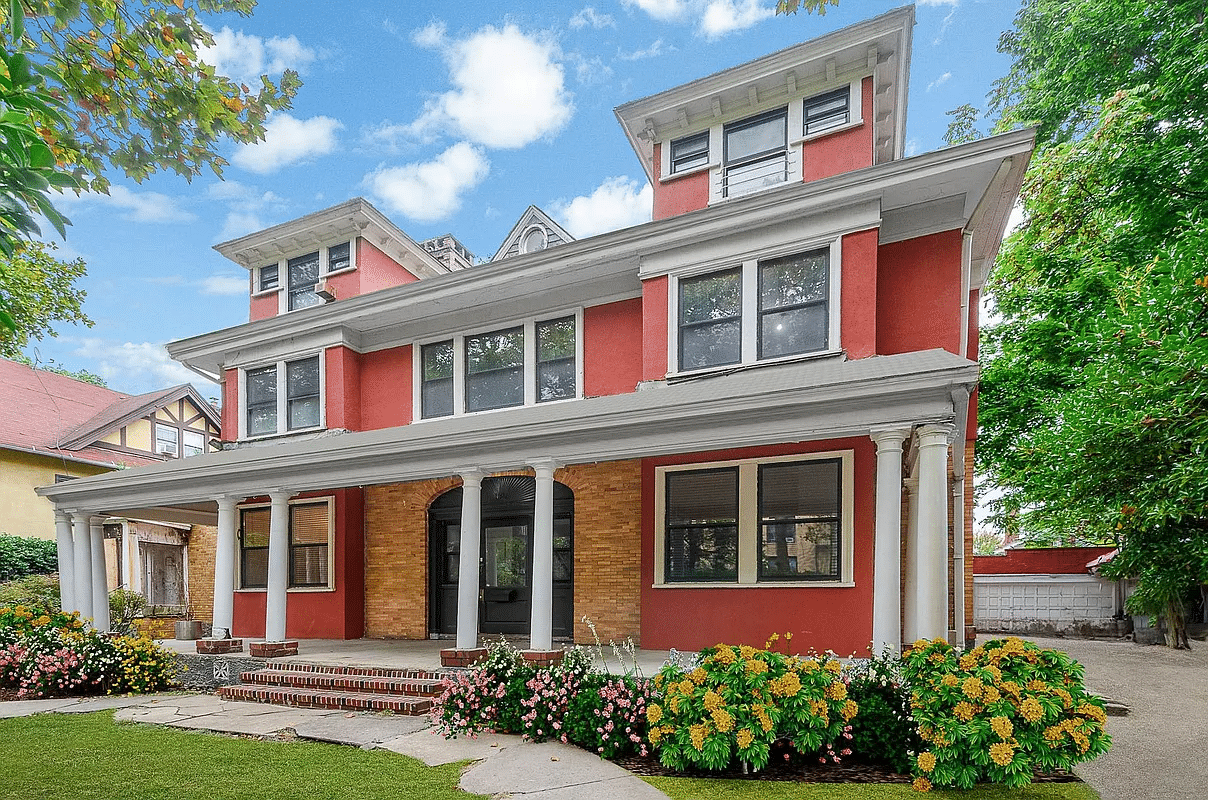 exterior  of red house with porch